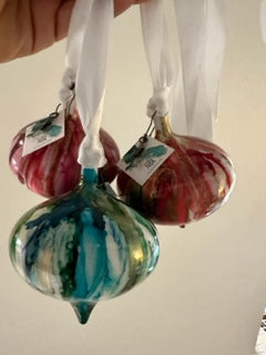Held Christmas Ornaments